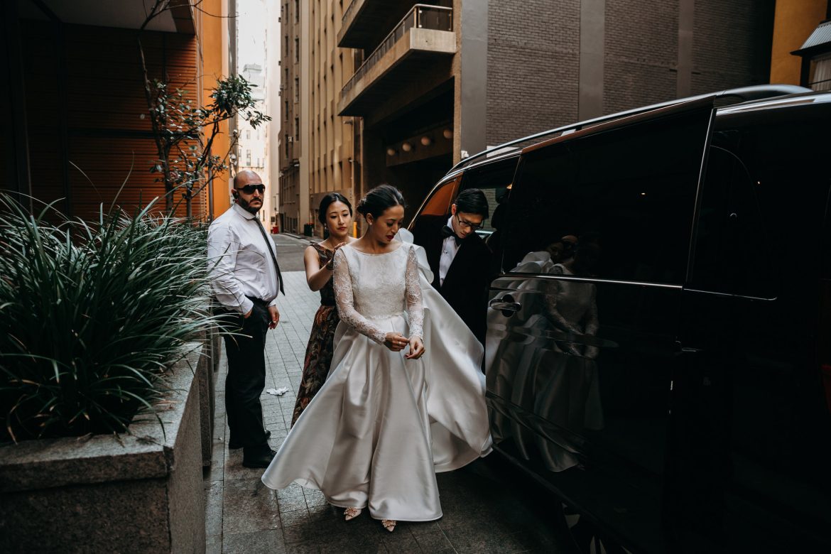 bride and groom arriving together