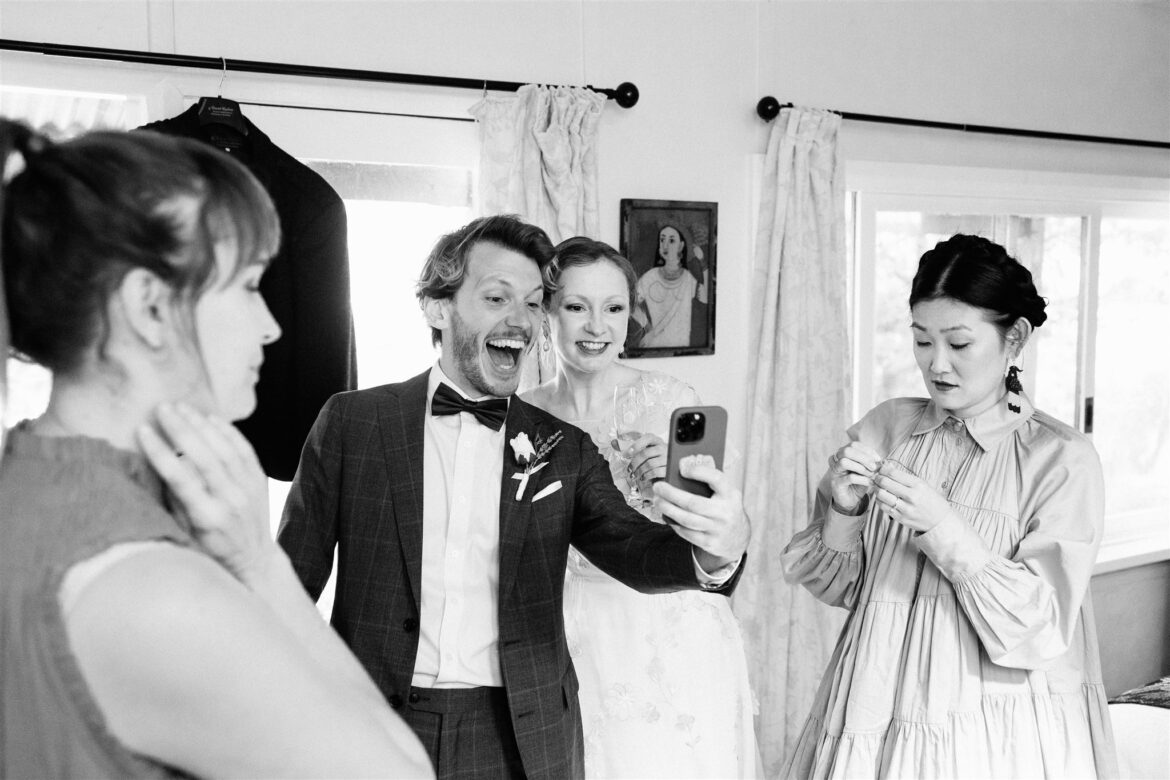 A bride and groom get ready together with their best friends