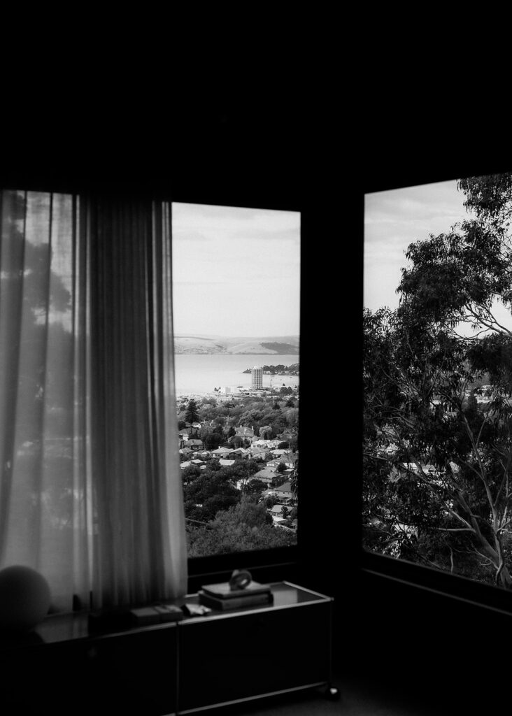 The view from their Airbnb apartment is of the bay in Hobart.