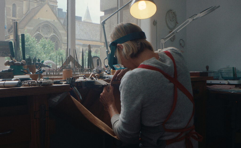 Jeweller, Laura, from Coral Covey Jewellery working at her bench in Melbourne